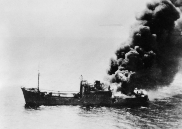 Japanese cargo ship Kenbu Maru burns during the battle of the Bismarck Sea, March 1943 (AWM 141996).jpg